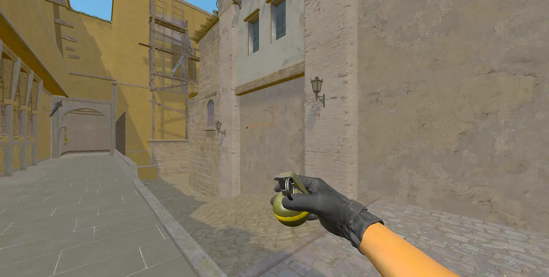 The HE grenade held in the hand on Mirage, the alley toward palace ahead of it