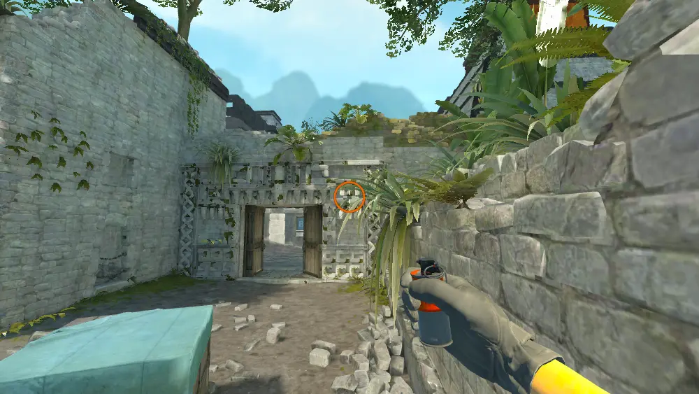 Standing on the Ruins Corner spot on Ancient, the aim mark on the point this smoke is thrown at.