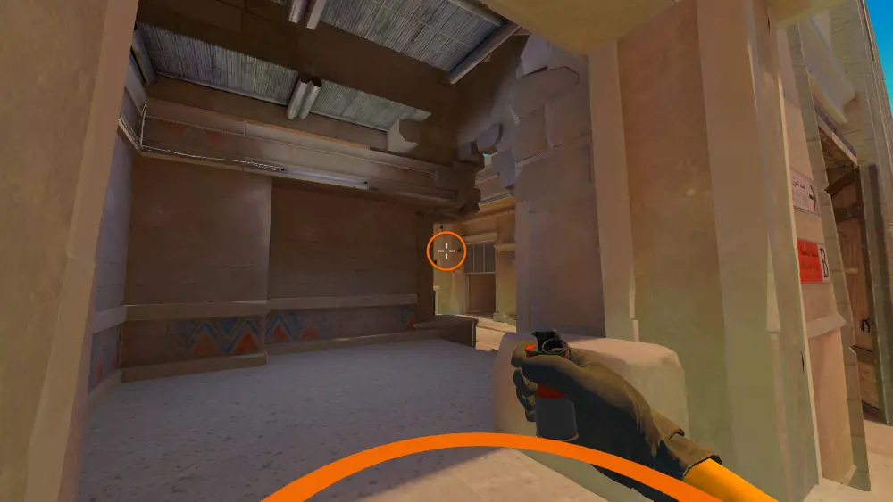 Standing on the Window spot on Anubis, the aim mark on the point this smoke is thrown at.