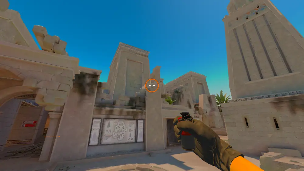 Standing on the CT Spawn spot on Anubis, the aim mark on the point this smoke is thrown at.