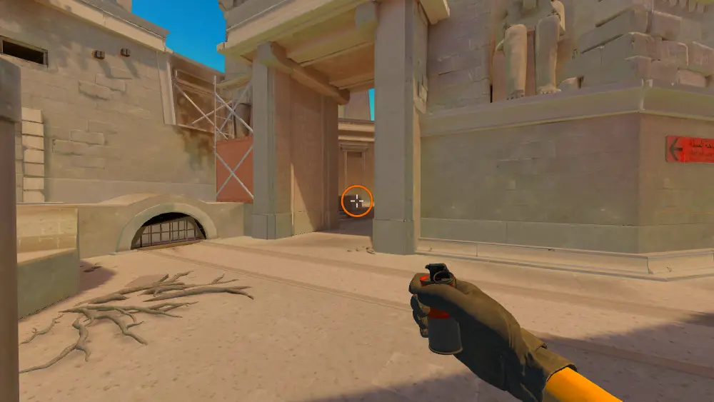 Standing on the Ruins spot on Anubis, the aim mark on the point this smoke is thrown at.
