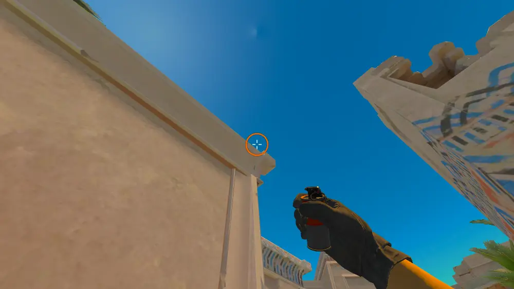 Standing on the Ruins spot on Anubis, the aim mark on the point this smoke is thrown at.