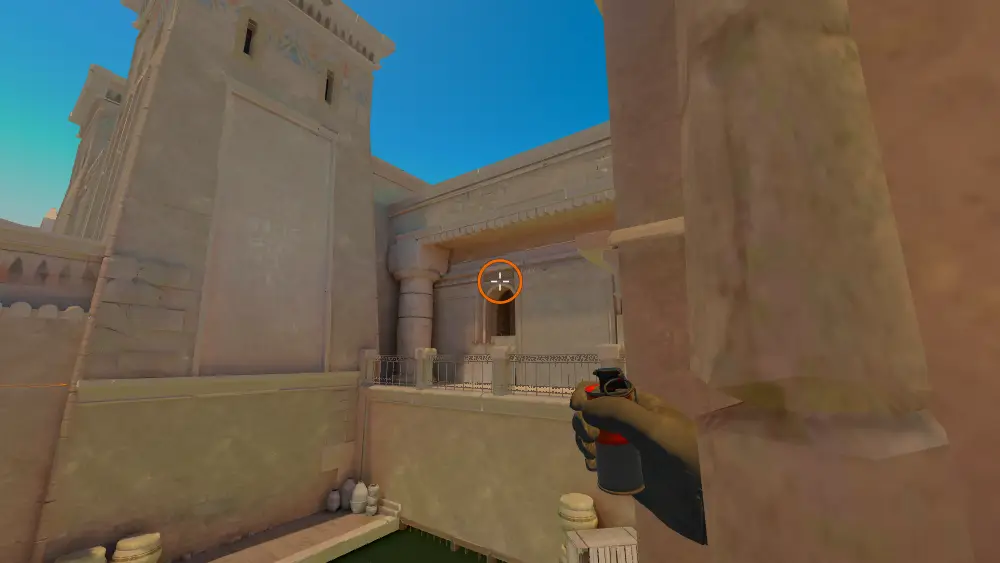 Standing on the T Upper spot on Anubis, the aim mark on the point this smoke is thrown at.
