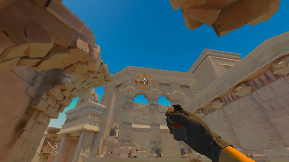 Standing on the Ruins spot on Anubis, the aim mark on the point this smoke is thrown at.