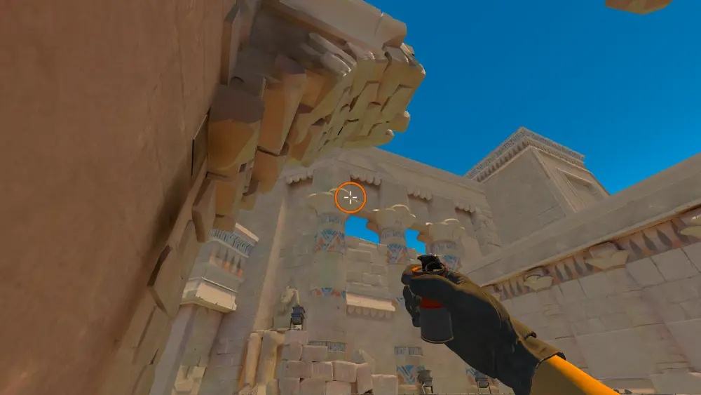 Standing on the Ruins spot on Anubis, the aim mark on the point this smoke is thrown at.