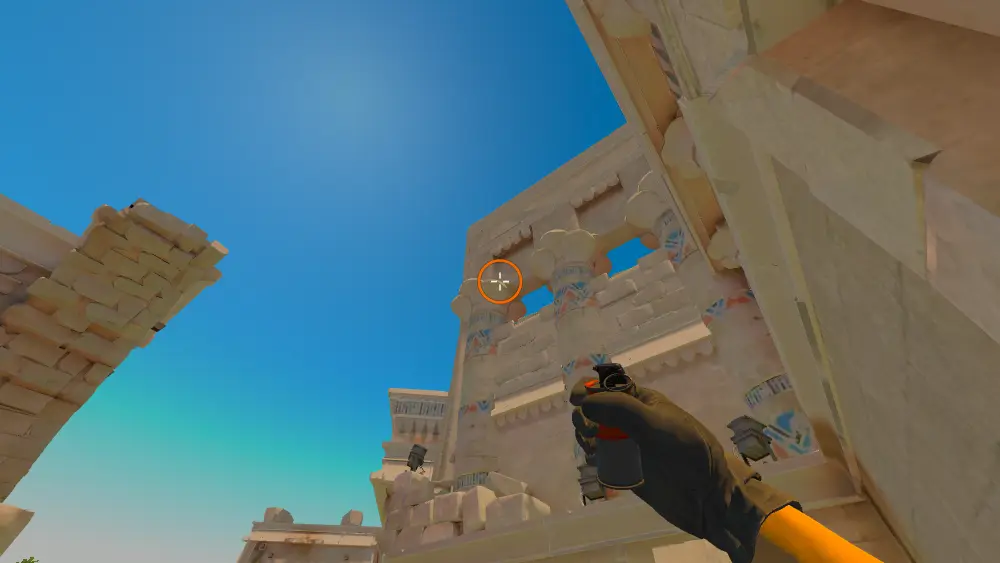 Standing on the Ruins spot on Anubis, the aim mark on the point this smoke is thrown at.