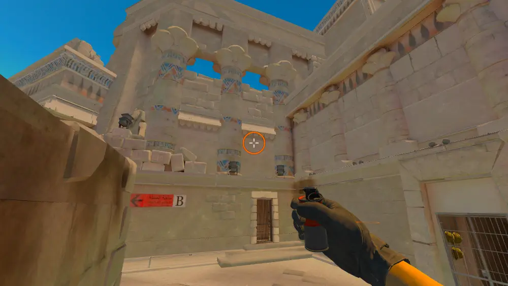 Standing on the Ruins spot on Anubis, the aim mark on the point this smoke is thrown at.