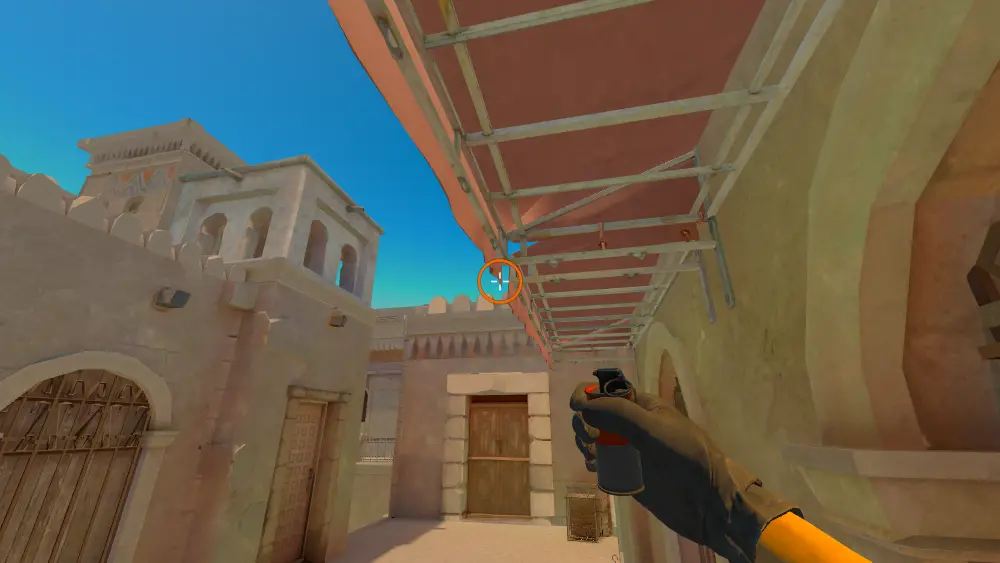 Standing on the Upper spot on Anubis, the aim mark on the point this smoke is thrown at.