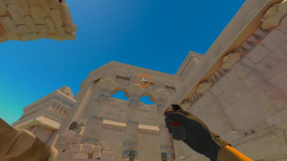 Standing on the Ruins spot on Anubis, the aim mark on the point this smoke is thrown at.