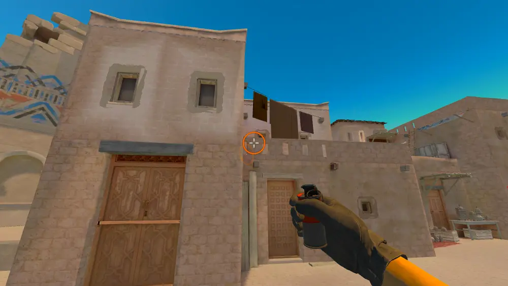 Standing on the T Spawn spot on Anubis, the aim mark on the point this smoke is thrown at.
