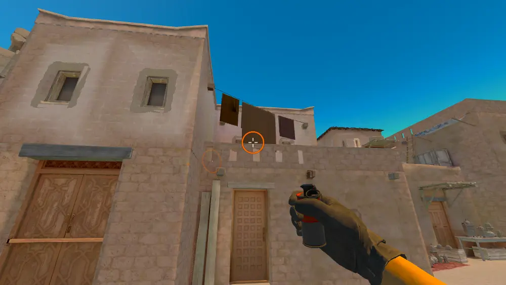 Standing on the T Spawn spot on Anubis, the aim mark on the point this smoke is thrown at.