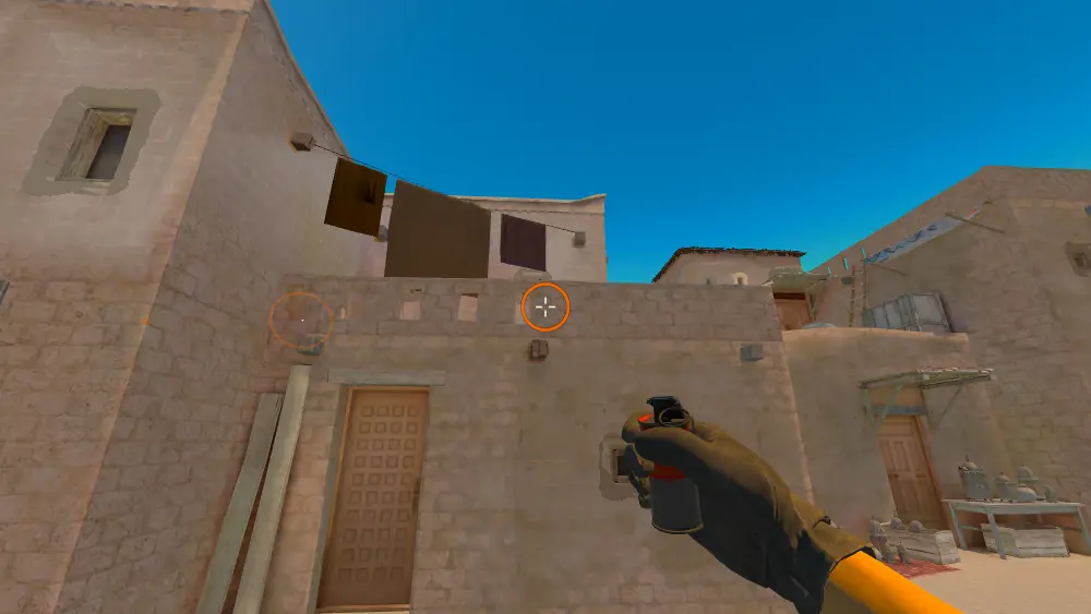 Standing on the T Spawn spot on Anubis, the aim mark on the point this smoke is thrown at.