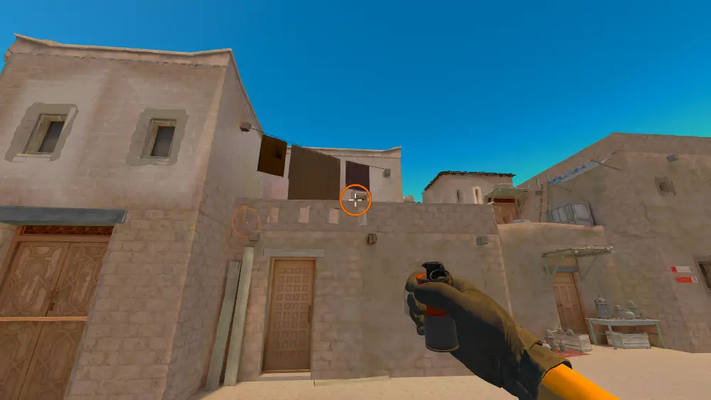 Standing on the T Spawn spot on Anubis, the aim mark on the point this smoke is thrown at.