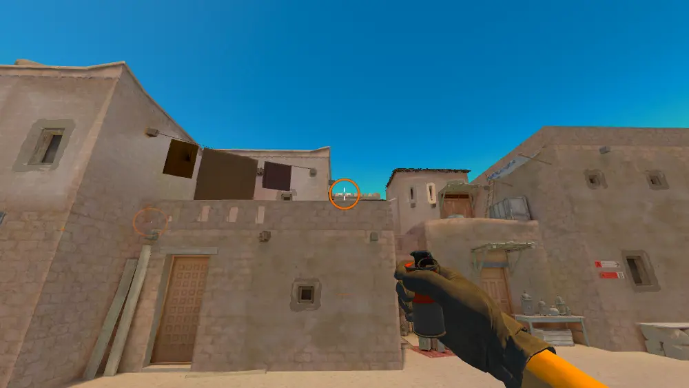 Standing on the T Spawn spot on Anubis, the aim mark on the point this smoke is thrown at.