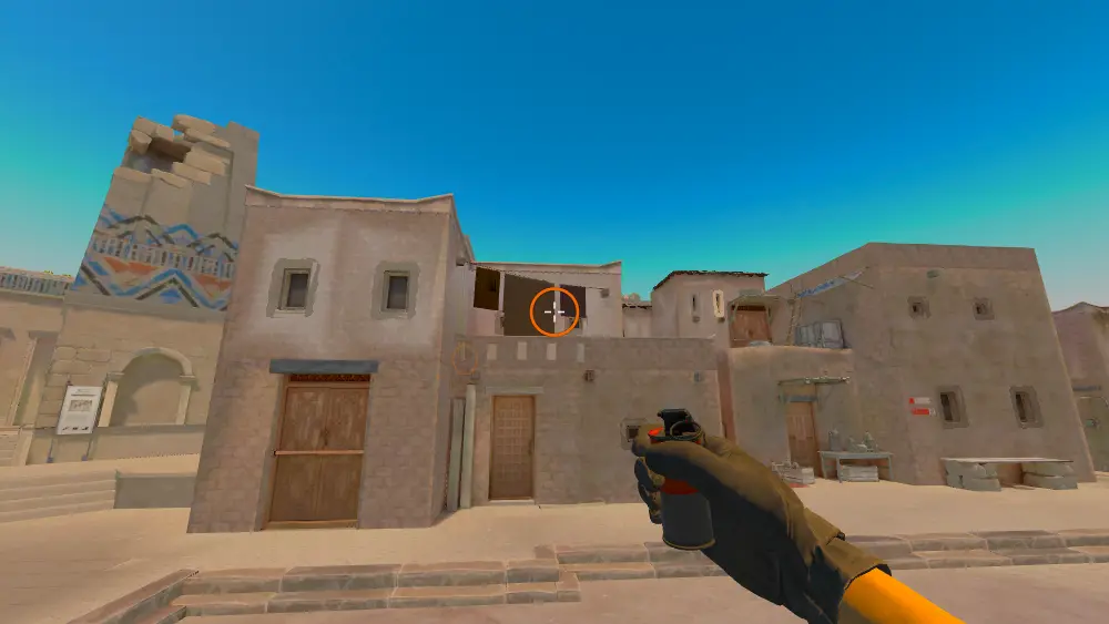 Standing on the T Spawn spot on Anubis, the aim mark on the point this smoke is thrown at.