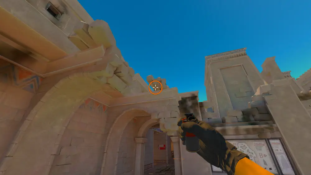 Standing on the CT Spawn spot on Anubis, the aim mark on the point this smoke is thrown at.