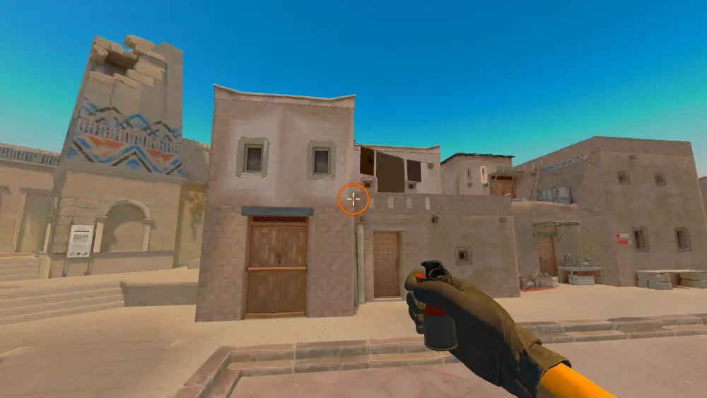 Standing on the T Spawn1 spot on Anubis, the aim mark on the point this smoke is thrown at.