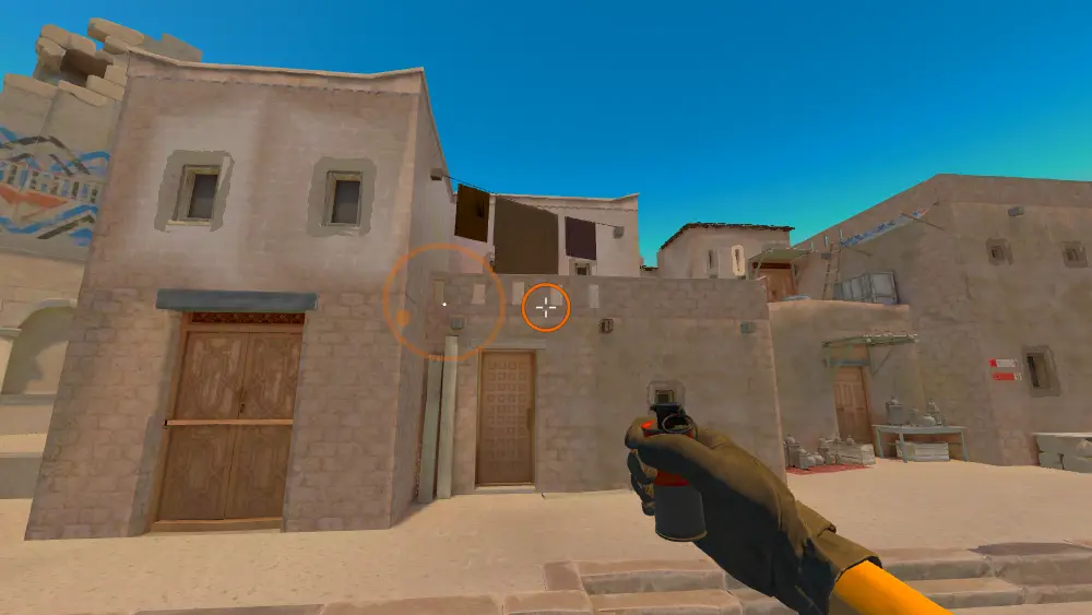 Standing on the T Spawn10 spot on Anubis, the aim mark on the point this smoke is thrown at.