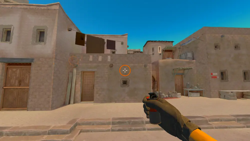 Standing on the T Spawn11 spot on Anubis, the aim mark on the point this smoke is thrown at.