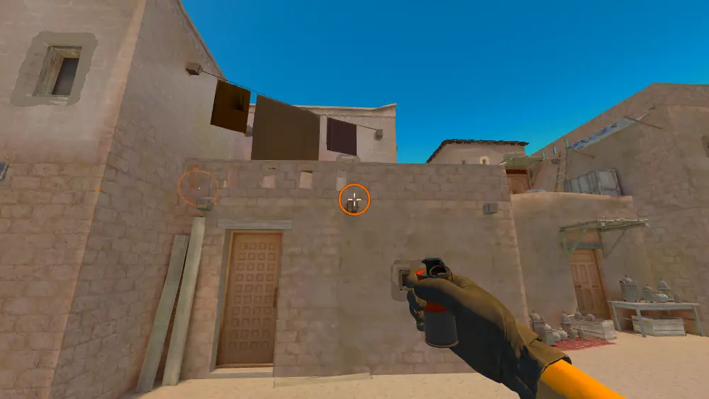 Standing on the T Spawn2 spot on Anubis, the aim mark on the point this smoke is thrown at.