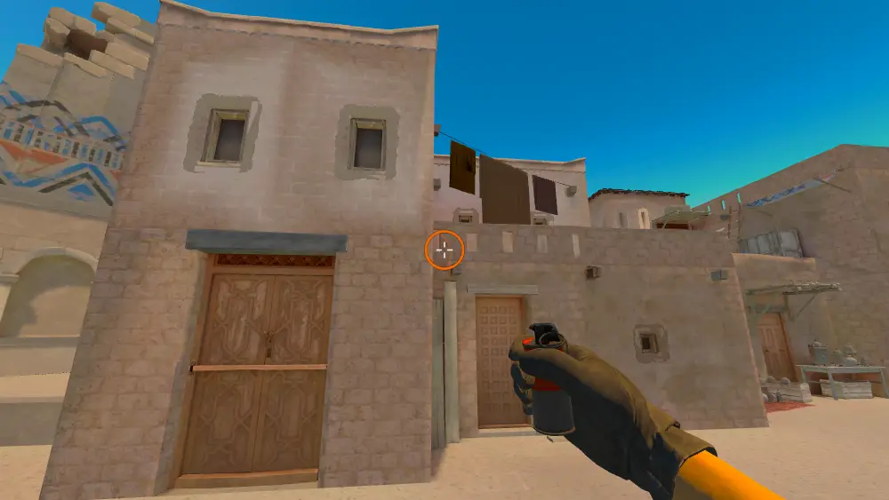 Standing on the T Spawn4 spot on Anubis, the aim mark on the point this smoke is thrown at.
