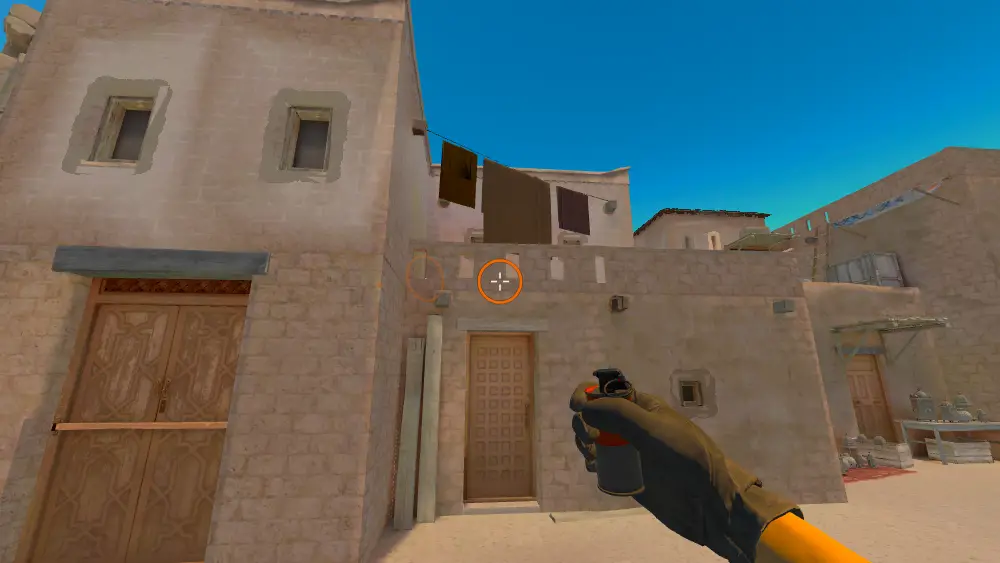 Standing on the T Spawn5 spot on Anubis, the aim mark on the point this smoke is thrown at.