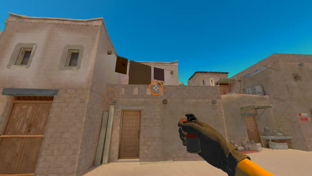 Standing on the T Spawn6 spot on Anubis, the aim mark on the point this smoke is thrown at.