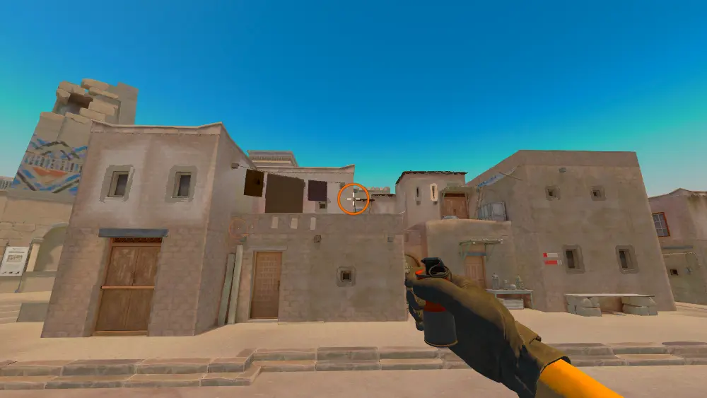 Standing on the T Spawn13 spot on Anubis, the aim mark on the point this smoke is thrown at.