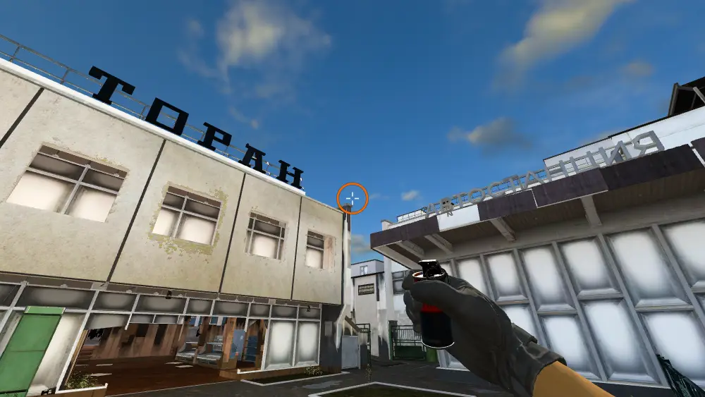 Standing on the CT Spawn spot on Cache, the aim mark on the point this smoke is thrown at.