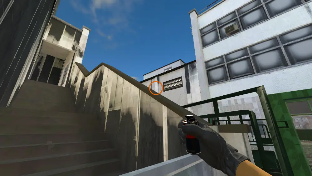 Standing on the CT Spawn spot on Cache, the aim mark on the point this smoke is thrown at.