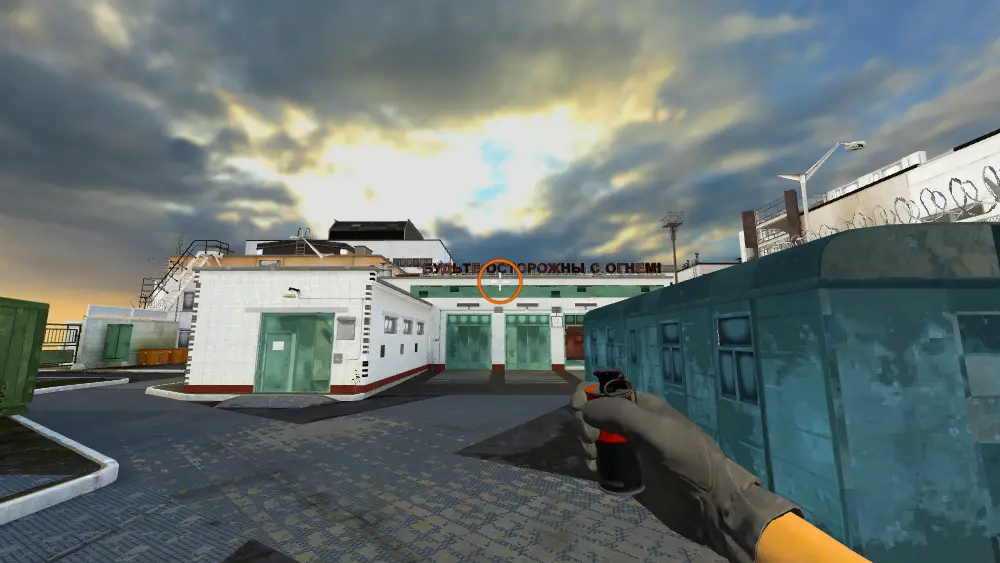 Standing on the T Spawn spot on Cache, the aim mark on the point this smoke is thrown at.