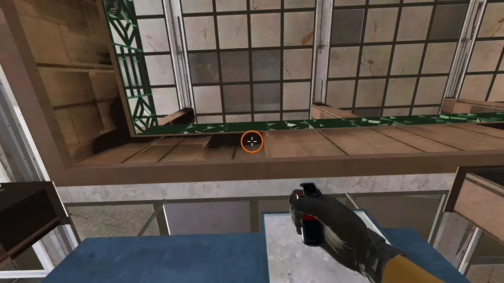 Standing on the CT Spawn spot on Cache, the aim mark on the point this smoke is thrown at.