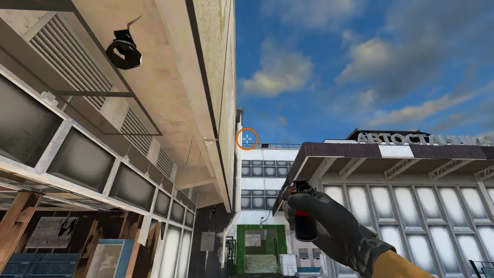 Standing on the CT Spawn spot on Cache, the aim mark on the point this smoke is thrown at.