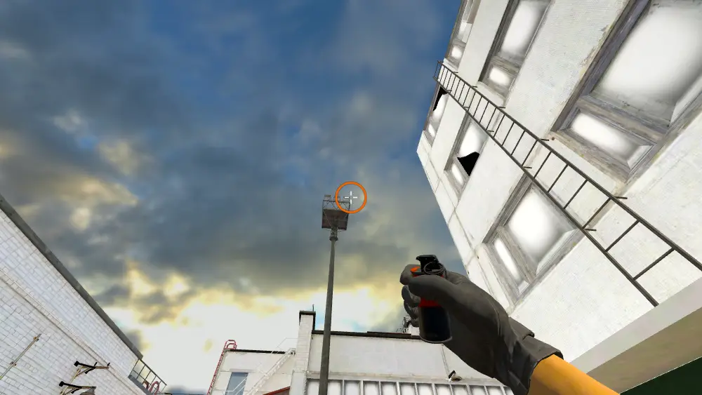 Standing on the T Truck spot on Cache, the aim mark on the point this smoke is thrown at.