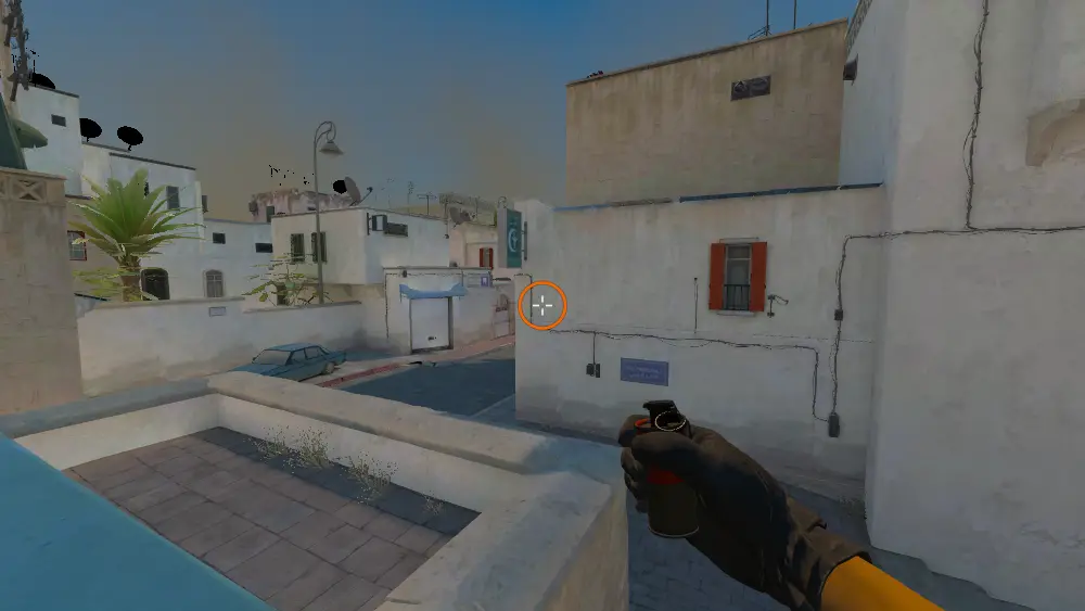 Standing on the T Plant spot on Dust2, the aim mark on the point this flash is thrown at.