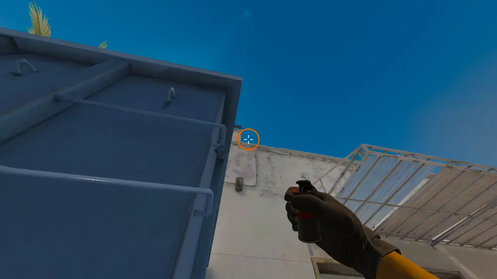 Standing on the Blue Box spot on Dust2, the aim mark on the point this smoke is thrown at.