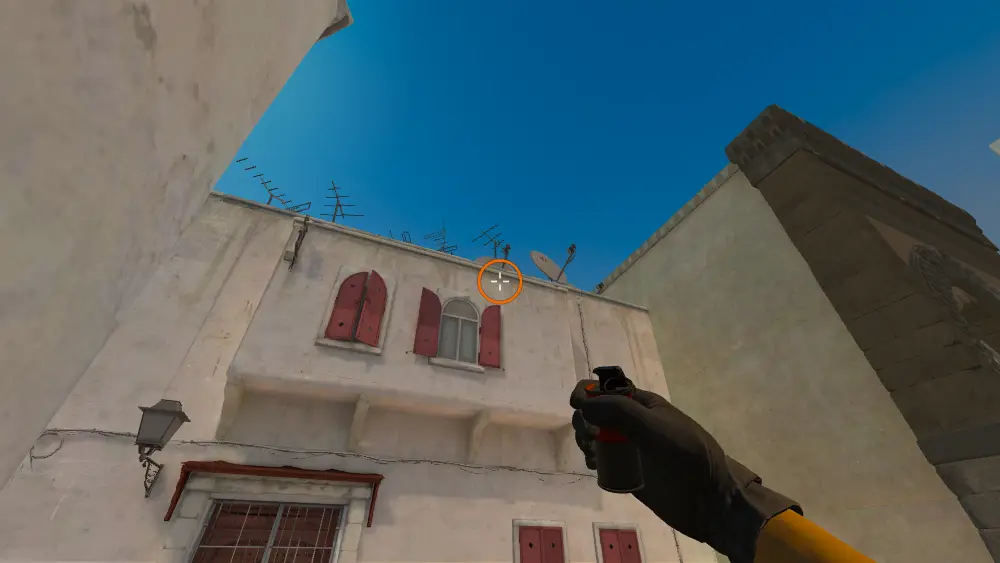 Standing on the Outside Long spot on Dust2, the aim mark on the point this smoke is thrown at.
