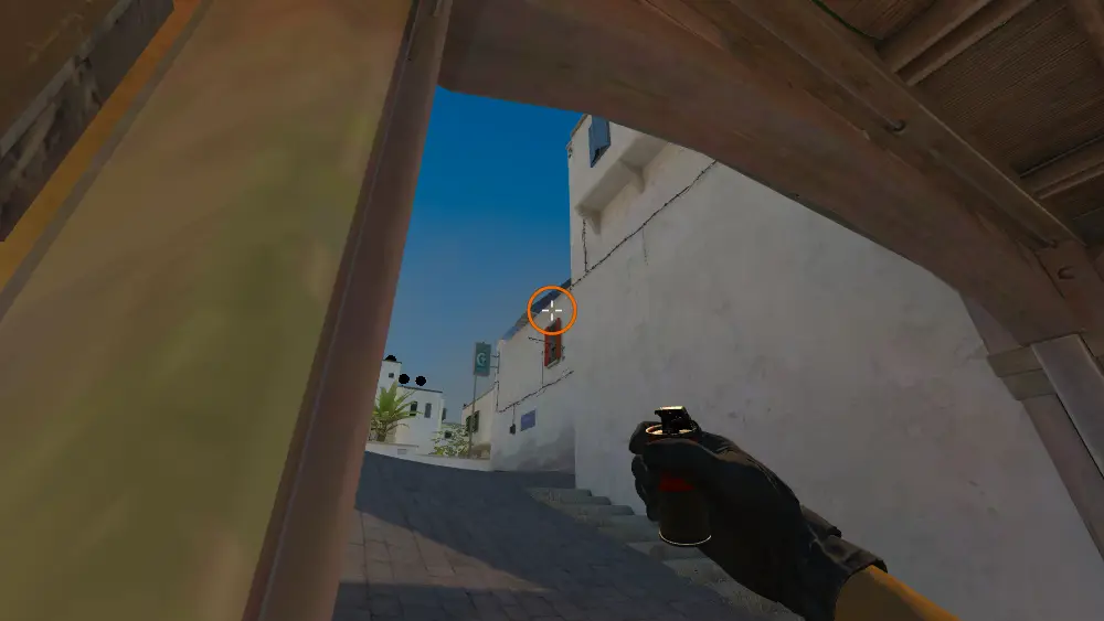 Standing on the CT Spawn spot on Dust2, the aim mark on the point this flash is thrown at.