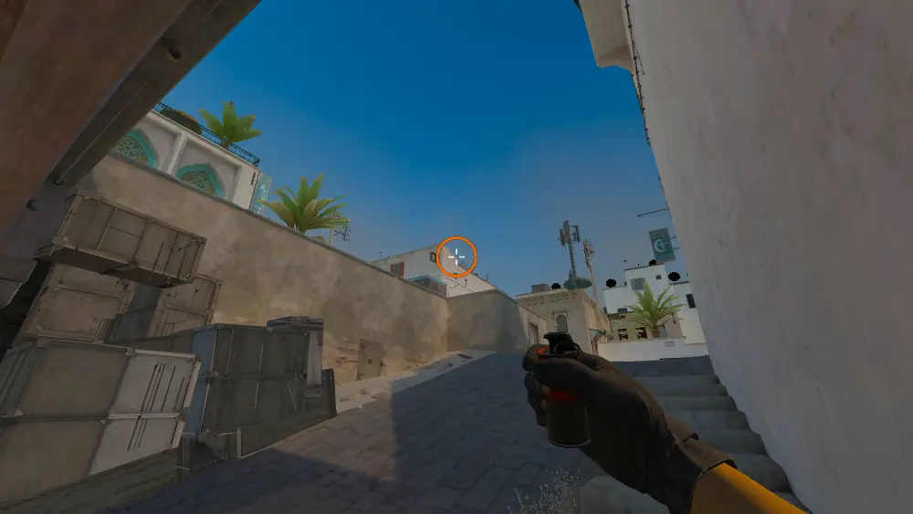 Standing on the CT Spawn spot on Dust2, the aim mark on the point this molotov is thrown at.