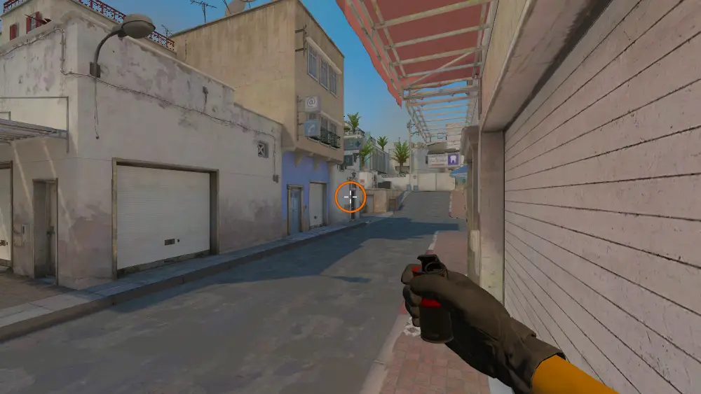 Standing on the Long Caf To Cross spot on Dust2, the aim mark on the point this flash is thrown at.
