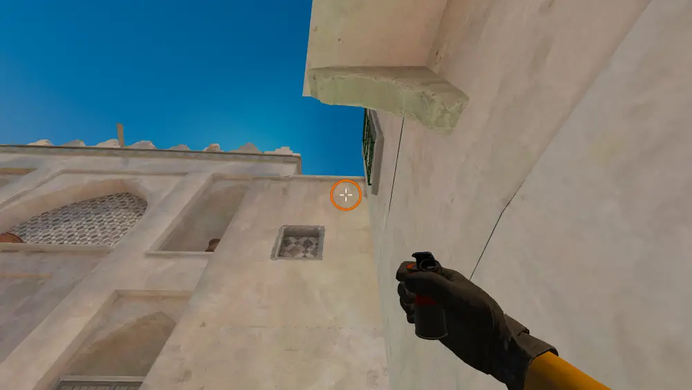 Standing on the Outside B Tunnels spot on Dust2, the aim mark on the point this smoke is thrown at.