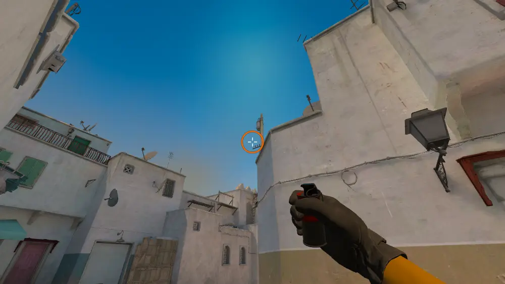 Standing on the Top Mid spot on Dust2, the aim mark on the point this smoke is thrown at.