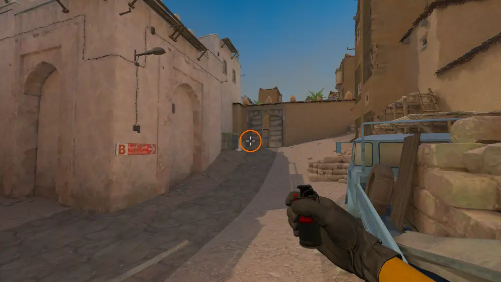 Standing on the CT Mid spot on Dust2, the aim mark on the point this smoke is thrown at.