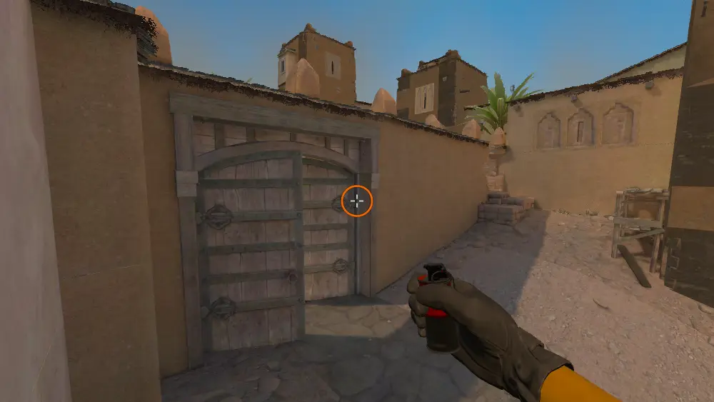 Standing on the Dust2 spot on Dust2, the aim mark on the point this molotov is thrown at.
