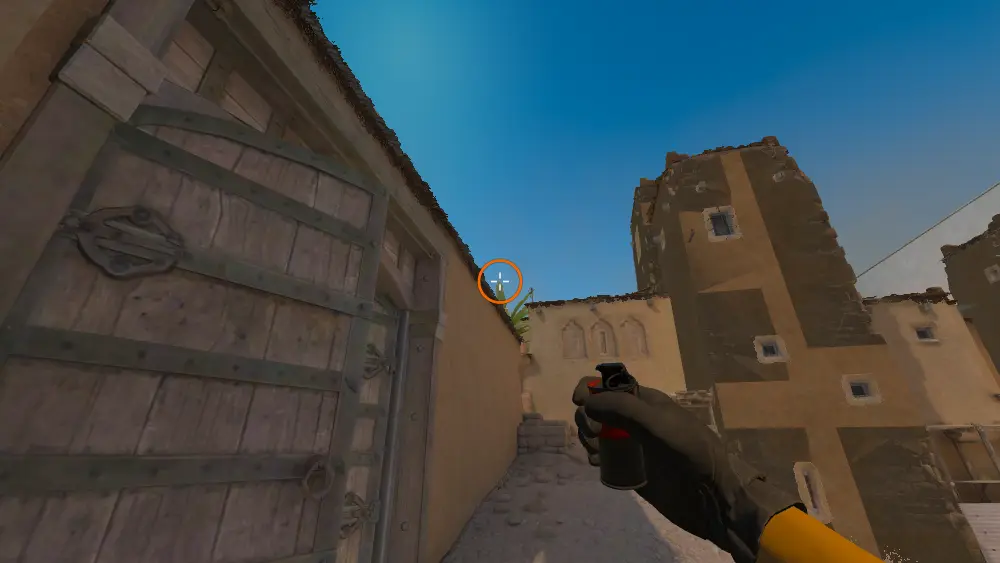 Standing on the Doors1 spot on Dust2, the aim mark on the point this smoke is thrown at.