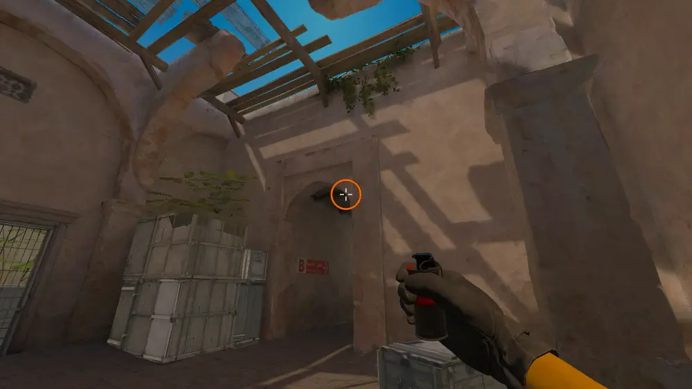 Standing on the Upper Tunnels spot on Dust2, the aim mark on the point this flash is thrown at.