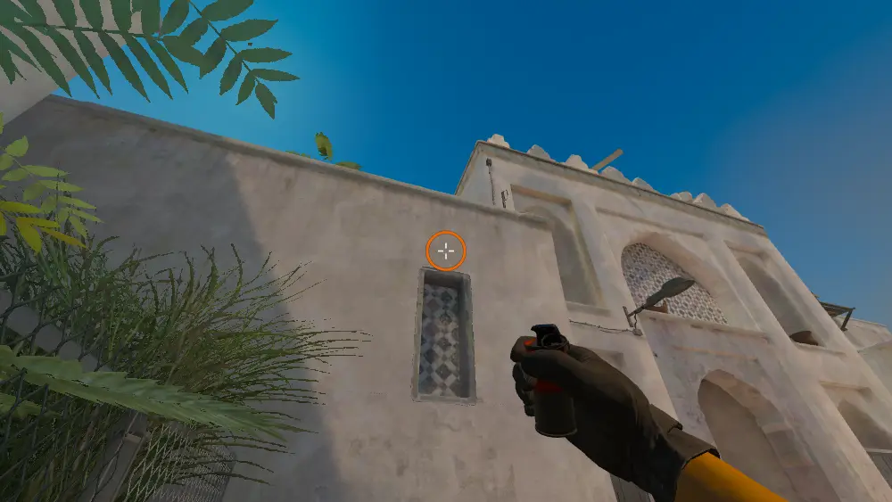 Standing on the Outside B Tunnels spot on Dust2, the aim mark on the point this smoke is thrown at.