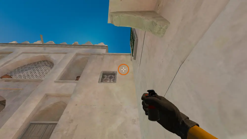 Standing on the Outside B Tunnels spot on Dust2, the aim mark on the point this smoke is thrown at.