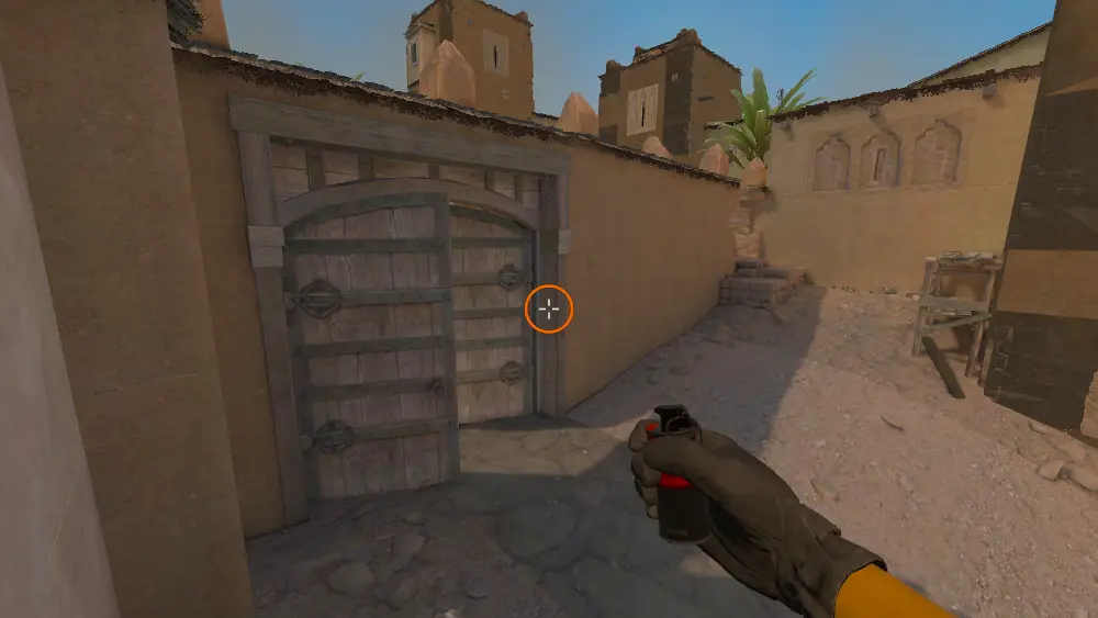 Standing on the Outside B Doors spot on Dust2, the aim mark on the point this molotov is thrown at.