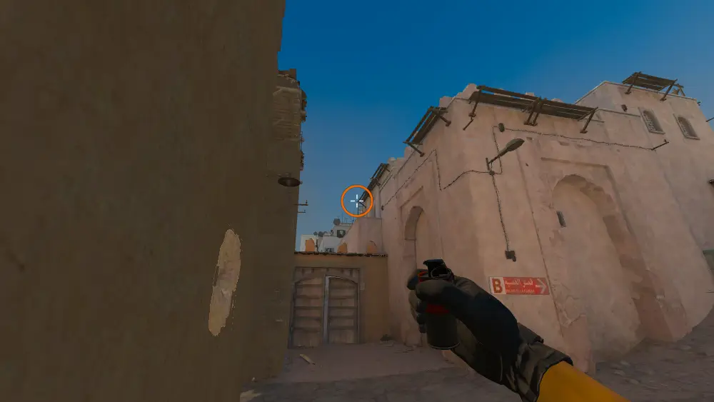 Standing on the CT Mid spot on Dust2, the aim mark on the point this smoke is thrown at.